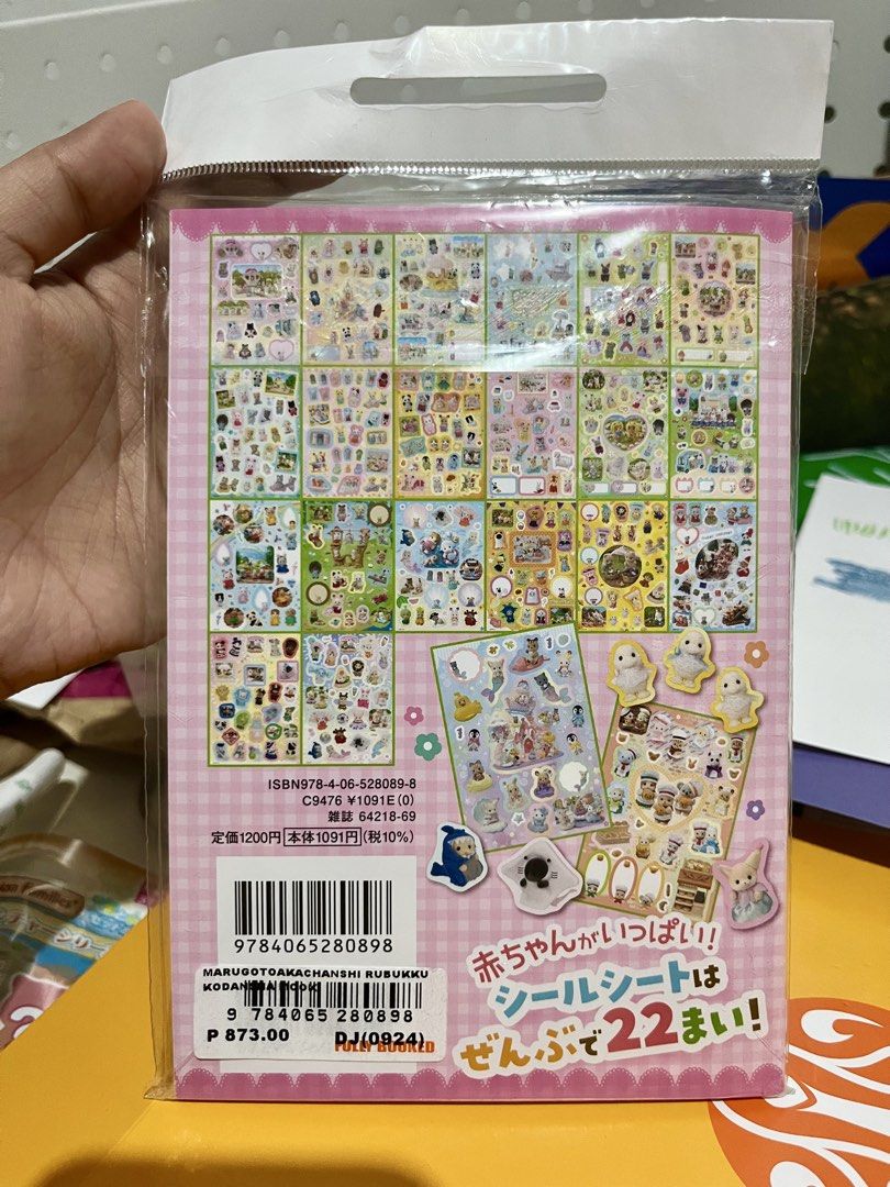 Sylvanian Families Sticker Book (Category: Children's Books) located in Quezon City. Submitted by anikanikgirly (Listing ID 1437660065, Image 2). Description: - Brand new, sealed Sylvanian Families sticker book. - Includes 22 sticker sheets. - Features various Sylvanian Families characters. - Original price tag: ₱873. - Perfect for collectors and fans!.