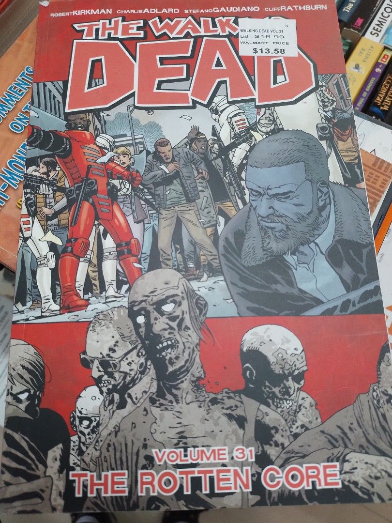 The Walking Dead Volume 31: The Rotten Core (Category: Comics & Manga) located in Caloocan City. Submitted by teacherjen53235 (Listing ID 1437662066, Image 1). Description: - The Walking Dead Volume 31: The Rotten Core comic book. - Features the story of the world after the dead have risen. - Focuses on survival in a post-apocalyptic world. - Explores themes of responsibility and the loss of normalcy. - Perfect for fans of The Walking Dead series