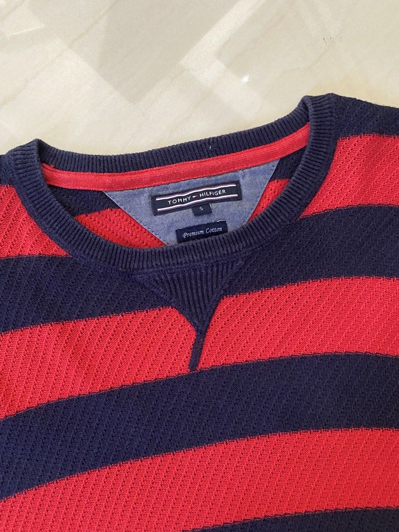 Tommy Hillfiger Knitted Striped Sweater (Category: Coats, Jackets and Outerwear) located in Dumaguete. Submitted by infiniteloot_ (Listing ID 1437684674, Image 2). Description: Tommy Hillfiger Knitted Striped Sweater Size S on tag fits M-L 28 length x 19 width (stretchable) good condition 500 php.