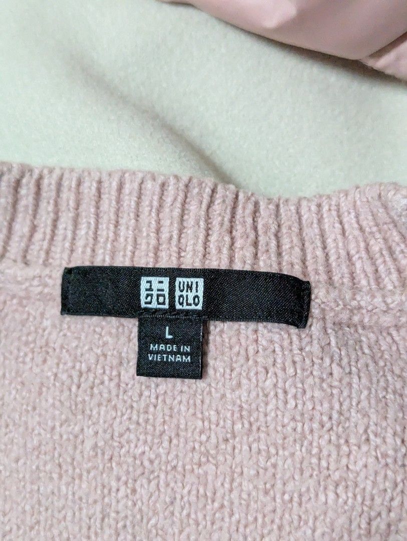 Uniqlo Pink Sweater - Size L (Category: Coats, Jackets and Outerwear) located in Tarlac. Submitted by sunshine_shopph (Listing ID 1437624007, Image 2). Description: - Uniqlo pink sweater - Size: L - Features: Crew neck, long sleeves, slightly puffed design - Made in Vietnam - Versatile for various outfits.