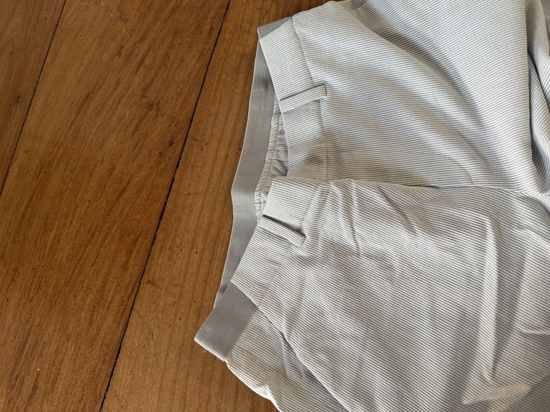 Uniqlo Striped Pants (Category: Other Bottoms) located in Quezon City. Submitted by cam.declutters (Listing ID 1437668734, Image 3). Description: - Uniqlo striped pants - Waist: 63-69cm - Hips: 88-94cm - Material: Rayon, polyester, and nylon blend - Light color.