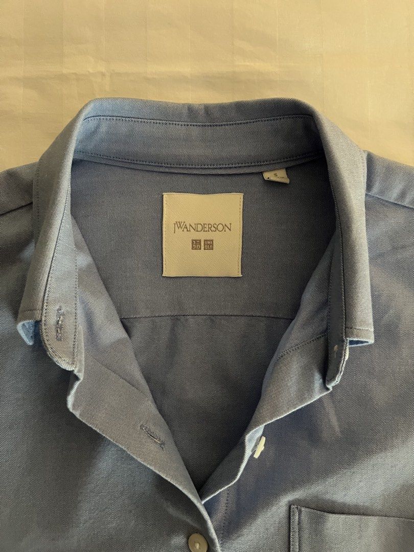 Uniqlo Top (Category: Longsleeves) located in Quezon City. Submitted by inthefrow (Listing ID 1437649890, Image 2). Description: - Preloved - Used just once so practically new - JW Anderson top in a cool blue - Slightly cropped - With a JW embroidered logo at the bottom left of the shirt • Best price already .