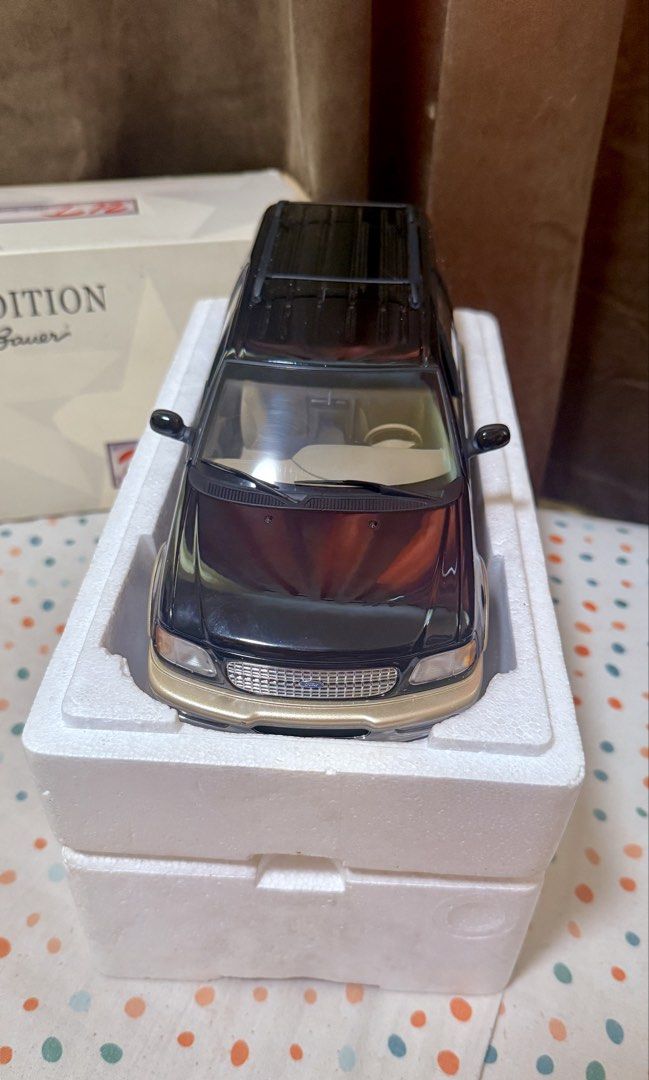 UT BLACK Ford Expedition Eddie Bauer 1:18 Scale (Category: Vehicle & Diecast Models) located in Manila. Submitted by yourtoothfairy (Listing ID 1437647064, Image 3). Description: - Ford Expedition Eddie Bauer diecast model - Scale: 1:18 - Color: Black exterior, tan interior - Includes original box and styrofoam packaging, never displayed. Wheels still screwed to the styro bottom . - Box condition: Shows some wear and tear Last photo is for refere