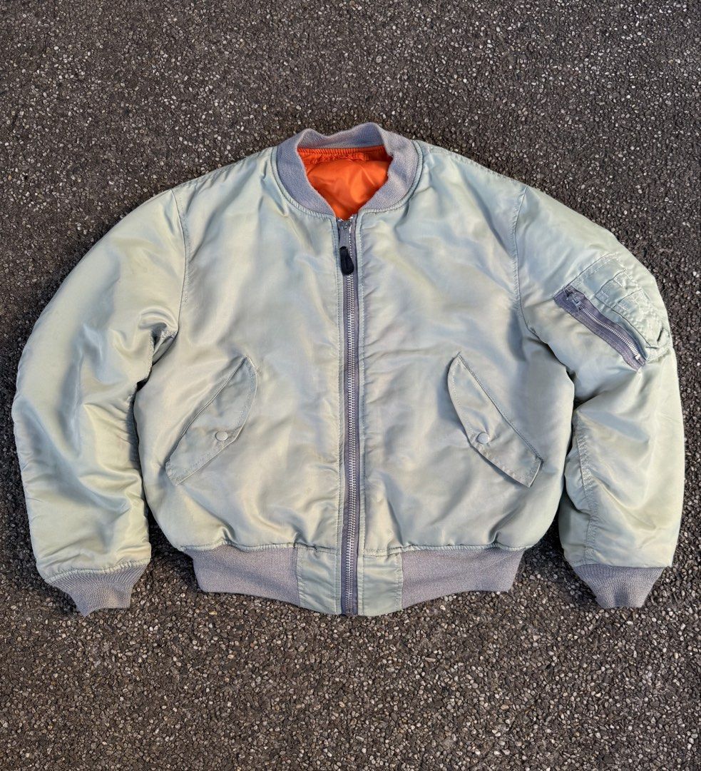 Vintage Alpha Industries MA-1 Bomber Jacket (Category: Coats, Jackets and Outerwear) located in Quezon City. Submitted by though.bare (Listing ID 1437747650, Image 1). Description: Fits on L up to XL for Men In worn condition, has a patched up tear on the shoulder (doesn't penetrate the reverse side) Width : 26" Length : 25" Sleeve : 24" Shoulder : 19" No-when worns. Listings not marked sold/reserved are available. These are preloved/used items, 