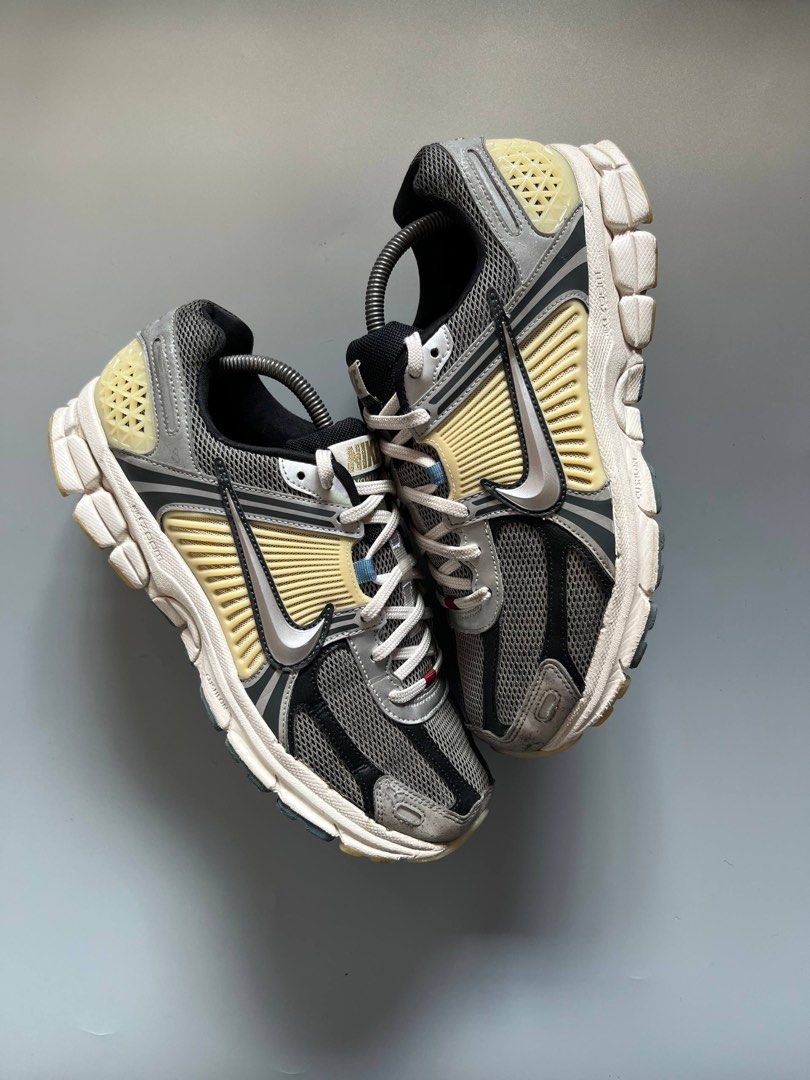 VOMERO 5 BLACK SILVER PHANTOM (10US) (Category: Sneakers) located in Baguio. Submitted by grabUrPairs (Listing ID 1437644946, Image 2). Description: - Nike Zoom Vomero 5 - Color: Grey, Black, Cream - Mesh upper - White swoosh - Cushioned sole - Lace-up closure - Nike logo on tongue and heel - Pre-owned.