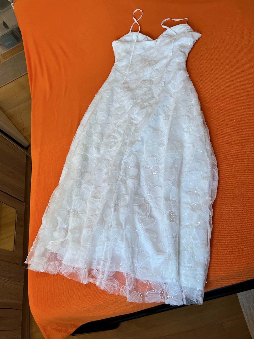 White Floral Spaghetti Strap Dress (Category: Dresses) located in Makati City. Submitted by kaassy (Listing ID 1437671215, Image 3). Description: - White floral dress - Spaghetti straps - Flowing skirt - Embellished with sequins - Ideal for special occasions - Delicate, layered fabric - best fits M frame.