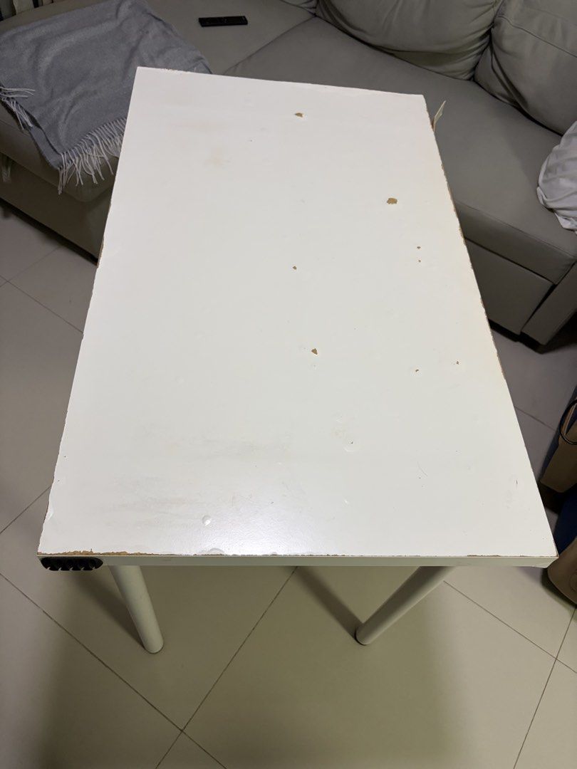 White Study Table (Category: Tables & Sets) located in Singapore. Submitted by pbl12pbl (Listing ID 1437705575, Image 2). Description: - White study table - Metal legs - Sturdy and functional - Suitable for students or small spaces.