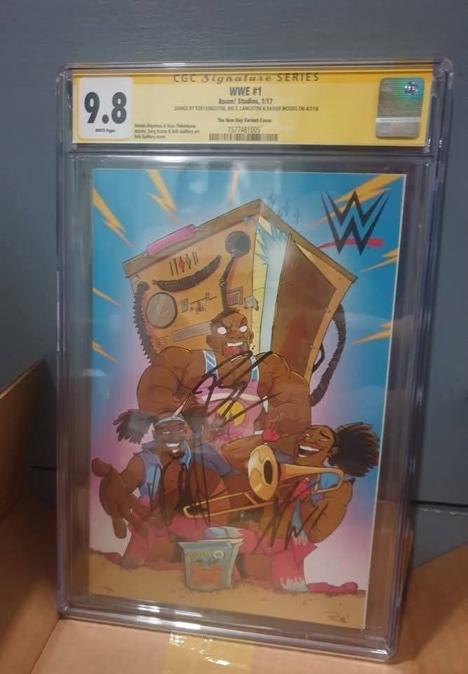 WWE New Day Autographed Signed Graded Comics (Category: Fan Merchandise) located in Mandaluyong City. Submitted by kbkcardsph (Listing ID 1437685502, Image 1). Description: A Rare Find! The New Day Triple Auto / Signature Signed by Xavier Woods, Big E and Kofi Kingston Auto on Boom Studios WWE Comics Graded and Authenticated by CGC 9.8 Grade non higher CGC cerification link: https://www.cgccomics.com/certlookup/1577481005/ Written by Ross Thibode