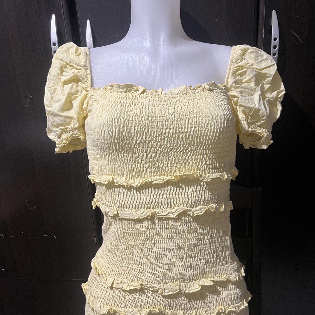 Yellow Ruffled Mini Dress | cute bodycon (Category: Dresses) located in Angeles City. Submitted by leo.rivera444 (Listing ID 1437737247, Image 1). Description: - Light yellow mini dress - Square neckline - Puff sleeves - Fitted bodice - Tiered, ruffled skirt - Textured fabric - Suitable for casual and semi-formal occasions Size S-M.