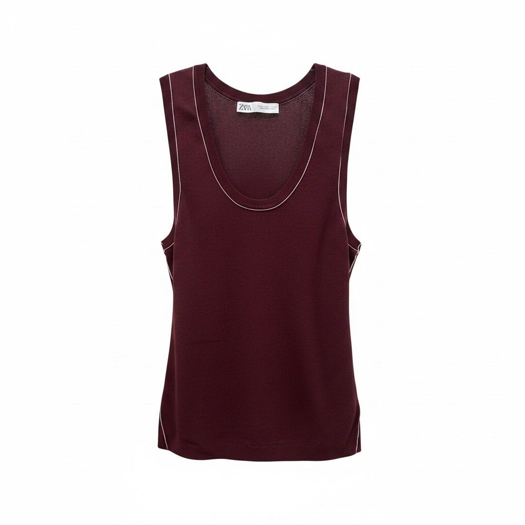 Zara Ribbed Tank Top - XL (Category: Sleeveless) located in Pasay City. Submitted by louiecruz.28 (Listing ID 1437613599, Image 1). Description: - Zara burgundy tank top - Size: XL - Features: Ribbed texture, white stitching details - Design: Scoop neck, fitted silhouette - Origin: Made in Bangladesh - Versatile style.