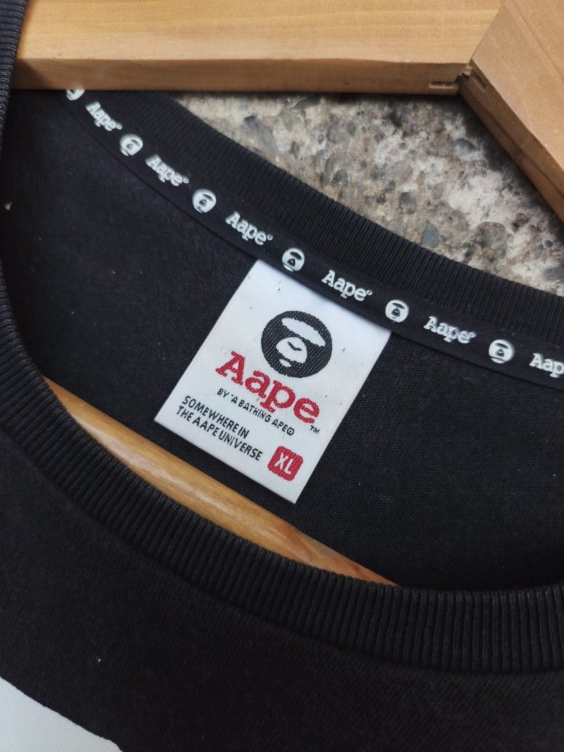 Aape "AOP" (Category: Tshirts & Polo Shirts ) located in Trento. Submitted by renanteblanco113 (Listing ID 1437866498, Image 3). Description: Aape "AOP" Dimes: 22X31 Excellent condition Color rate: 9.5/10 "color may vary due to lighting outdoor" Issue: need wash, minimal hairline .