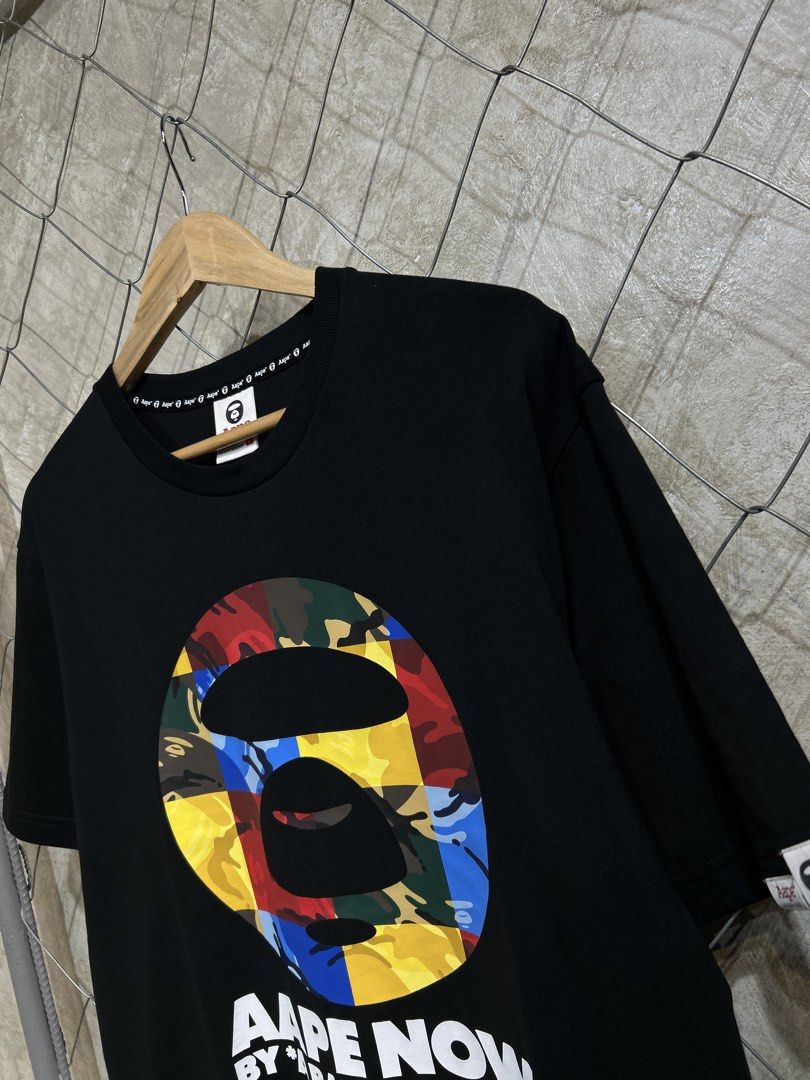 AAPE NOW by A Bathing Ape T-shirt (Category: Tshirts & Polo Shirts ) located in Manila. Submitted by ardobe.mnl (Listing ID 1437897106, Image 3). Description: -Aape Multicolor Face Logo Black Tee. Size: Large Dimes: 21.5x28 Condition: Good asnew Flaw: None! Dm for inquiries! 📥.