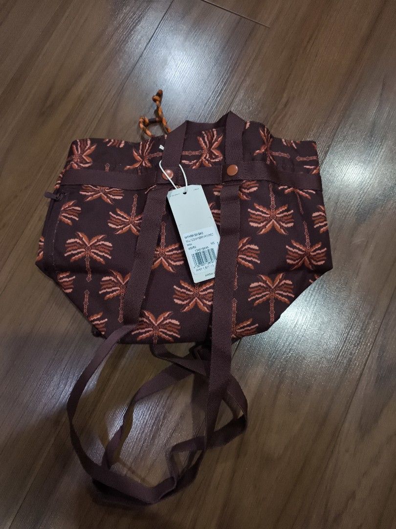 Adidas x Farm Rio mini bag (Category: Backpacks) located in Quezon City. Submitted by jhays02 (Listing ID 1437935496, Image 3). Description: - Adidas Ivy Park bag - Unique palm tree pattern - Drawstring closure - Convertible: backpack or tote - Adjustable straps - Spacious interior - Includes original tag with model name and price - Stylish and versatile.