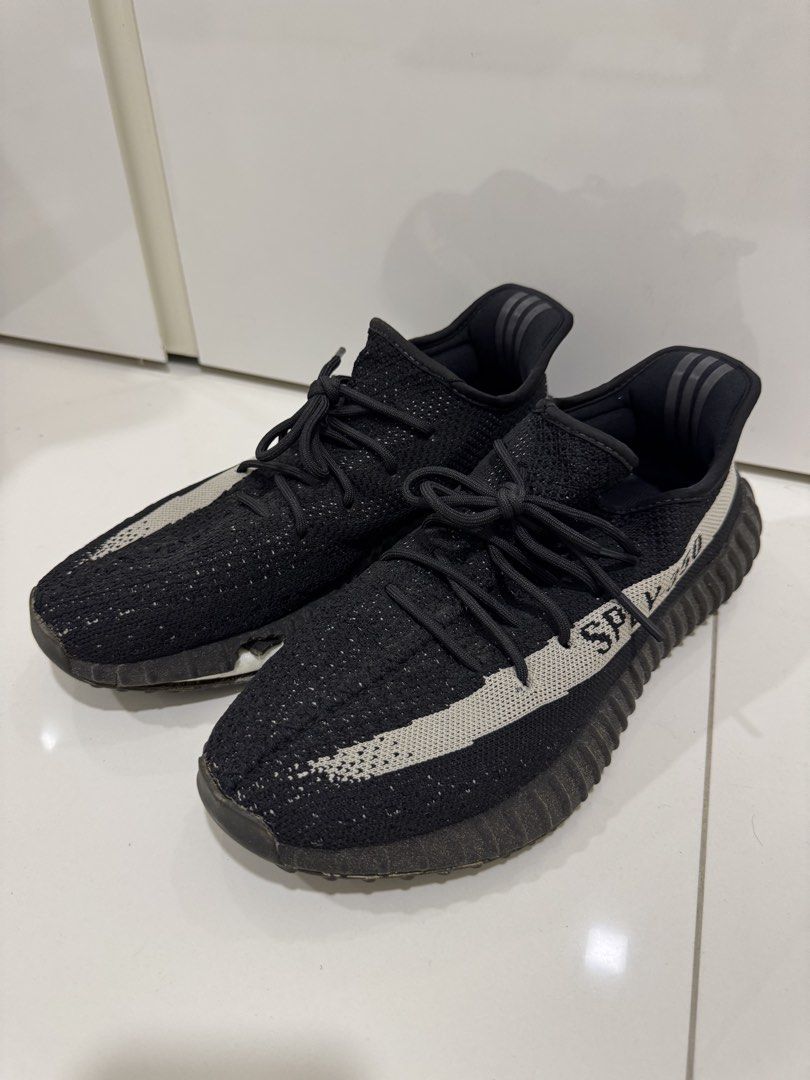 Adidas Yeezy Boost 350 V2 Black (Category: Sneakers) located in Singapore. Submitted by _misslemon (Listing ID 1437893726, Image 1). Description: - Significant wear and tear - Sole damage present - Priced to sell - Ideal for project or parts - Please view photos for condition details.