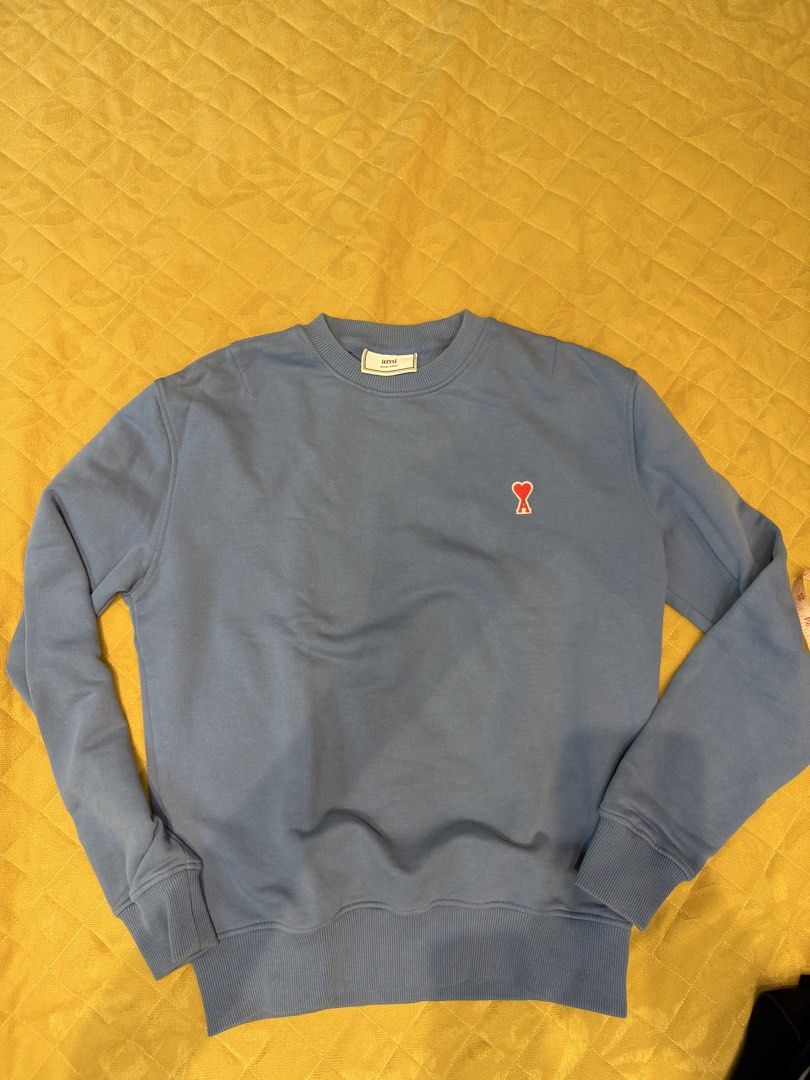 Original AMI Paris Crewneck Sweatshirt (Category: Coats, Jackets and Outerwear) located in Mandaluyong City. Submitted by norbert29 (Listing ID 1437801497, Image 1). Description: - original AMI Paris crewneck sweatshirt original price php 18k “You are defined by your clothes; you are what you wear. Rest assured that this item is original. Once you will see the item and you find out that is fake. I will return your money twice the price. Selling t