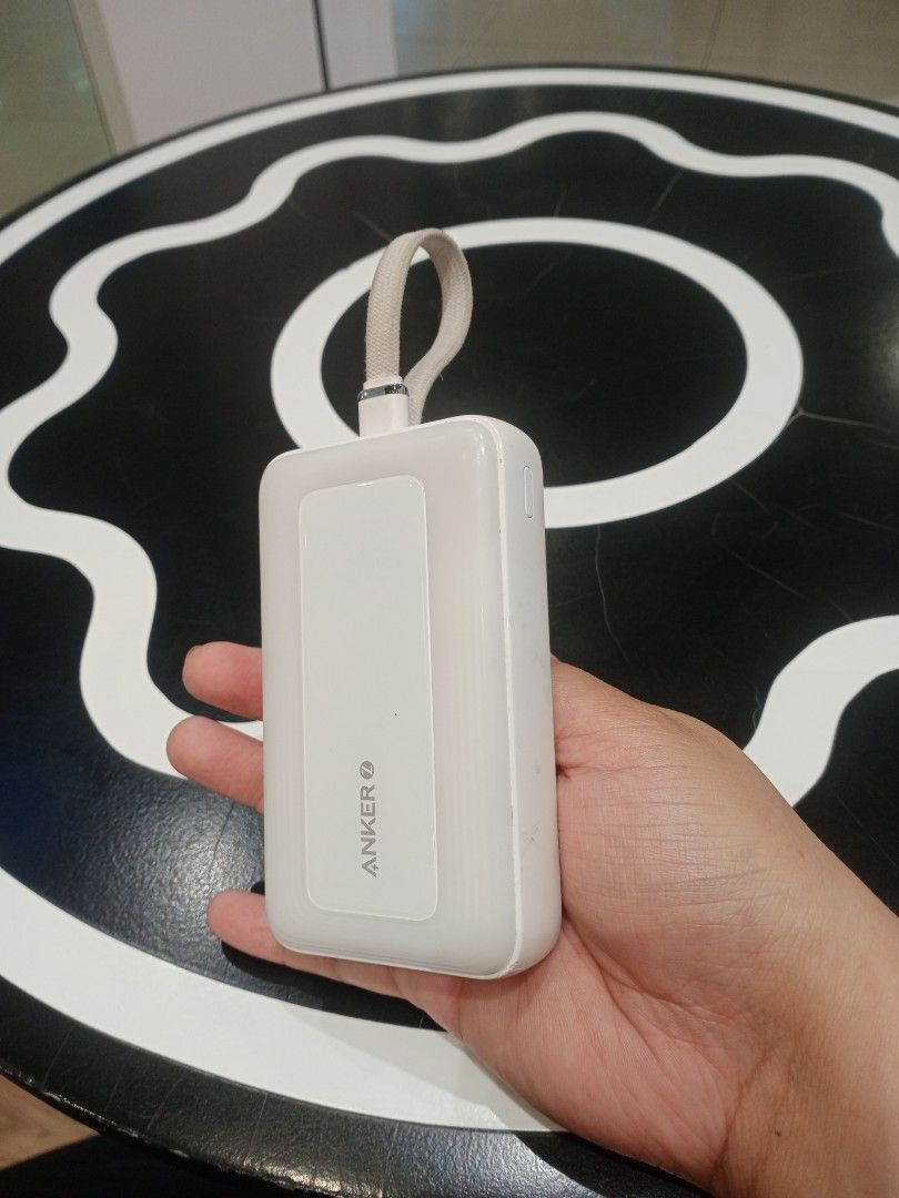 Anker Zolo Powerbank (Category: Batteries & Power Banks) located in Taguig. Submitted by secondhandsandbox (Listing ID 1437861393, Image 1). Description: Anker Zolo Powerbank - White - 10,000mAh - 30W - with built-in USB-C cable - Minor scratches do not affect the quality.