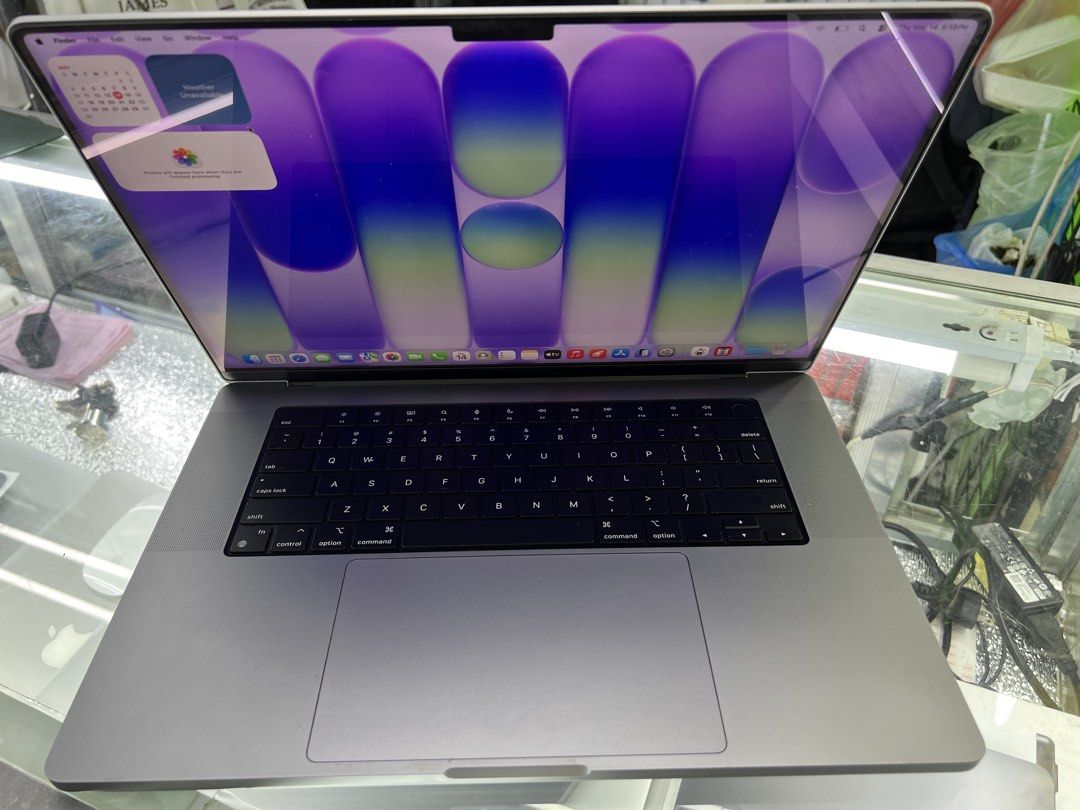 Apple MacBook Pro (Category: Laptops & Notebooks) located in Manila. Submitted by vaniextura (Listing ID 1437844903, Image 1). Description: - Space gray Apple MacBook Pro laptop 16inch -chip apple M2 Max -memory 32GB -storage 1TB -cc 107 -max capacity 87% -space gray - Includes keyboard and trackpad - Features multiple ports - Apple logo visible - Displays a colorful wallpaper No issues or dents No history repair All good working Very smooth perf