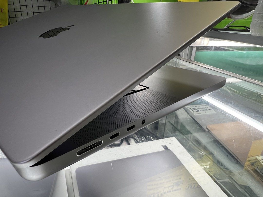 Apple MacBook Pro (Category: Laptops & Notebooks) located in Manila. Submitted by vaniextura (Listing ID 1437844903, Image 3). Description: - Space gray Apple MacBook Pro laptop 16inch -chip apple M2 Max -memory 32GB -storage 1TB -cc 107 -max capacity 87% -space gray - Includes keyboard and trackpad - Features multiple ports - Apple logo visible - Displays a colorful wallpaper No issues or dents No history repair All good working Very smooth perf