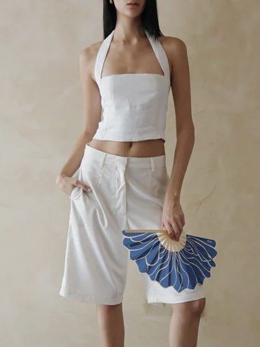 Araw The Line White Halter Top (Category: Sleeveless) located in Mandaluyong City. Submitted by izabelly (Listing ID 1437929721, Image 1). Description: Like new Araw Halter Top! Bought at Tropa Greenbelt A bit loose on me in the top area so I don’t really wear it much, but the model wears a medium too.