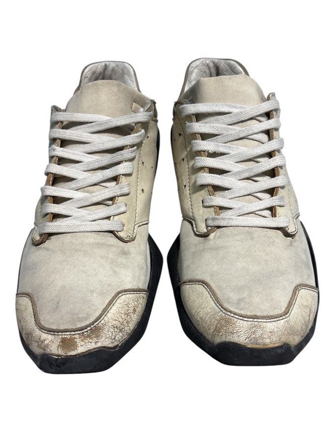 [ARCHIVE] Adidas x Rick Owens Tech Runner (2014) (Category: Sneakers) located in Cagayan de Oro. Submitted by thatsdopethrift (Listing ID 1437926559, Image 2). Description: Condition:Heavily Used / Needs Restoration A rare, archival pair of the 2014 Adidas x Rick Owens Tech Runner in the iconic Chalk White/Cream and Black colorway. This silhouette features the famous stealth-bomber geometric midsole structure and premium leather paneled upper. Gr