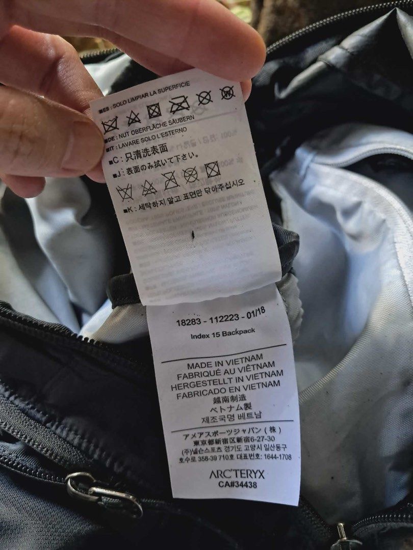 Arc'teryx Rucksack Index 15 Backpack - Black (packable) (Category: Backpacks) located in Baguio. Submitted by padisellsz (Listing ID 1437867410, Image 3). Description: - Arc'teryx Index 15 backpack (packable) - Color: Black - Very good condition - No issues - Made in Vietnam - Features: - Main compartment - Front pocket - Adjustable shoulder straps - Material: 100% nylon and polyester - Dimensions (approximate): - Height: 18 inches - Width: 11 in