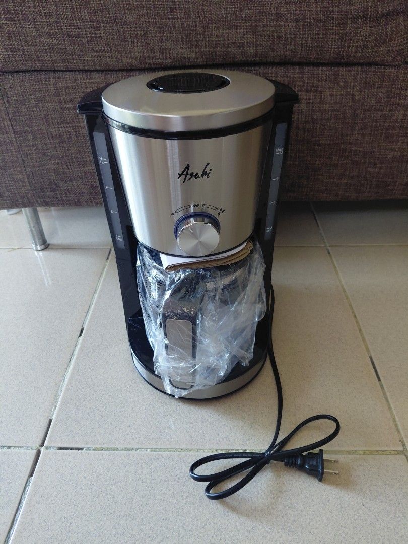 Asahi 12 Cups Aroma Coffee Maker (CM-054) (Category: Coffee Machines & Makers) located in Davao. Submitted by noyasells (Listing ID 1437810399, Image 2). Description: Asahi 12 Cups Aroma Coffee Maker (CM-054) - Brand New - Never used. Comes with original packaging - Message for more details.