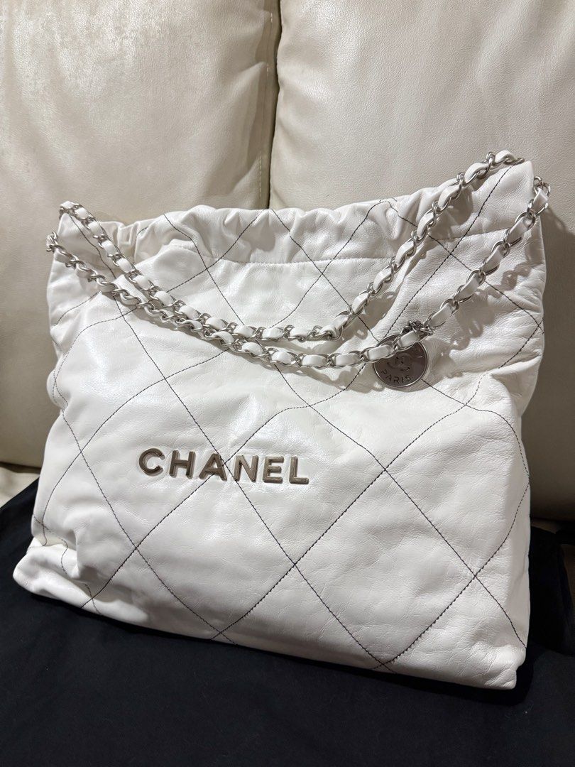 AUTHENTIC Chanel C22 in White Calfskin Small Silver Hardware (Category: Luxury Bags & Wallets) located in Quezon City. Submitted by closetofcoco (Listing ID 1437844260, Image 2). Description: FASTER REPLIES ON IG: THECLOSETOFCOCO GUARANTEED AUTHENTIC PM FOR INQUIRIES NO LOW BALLING.