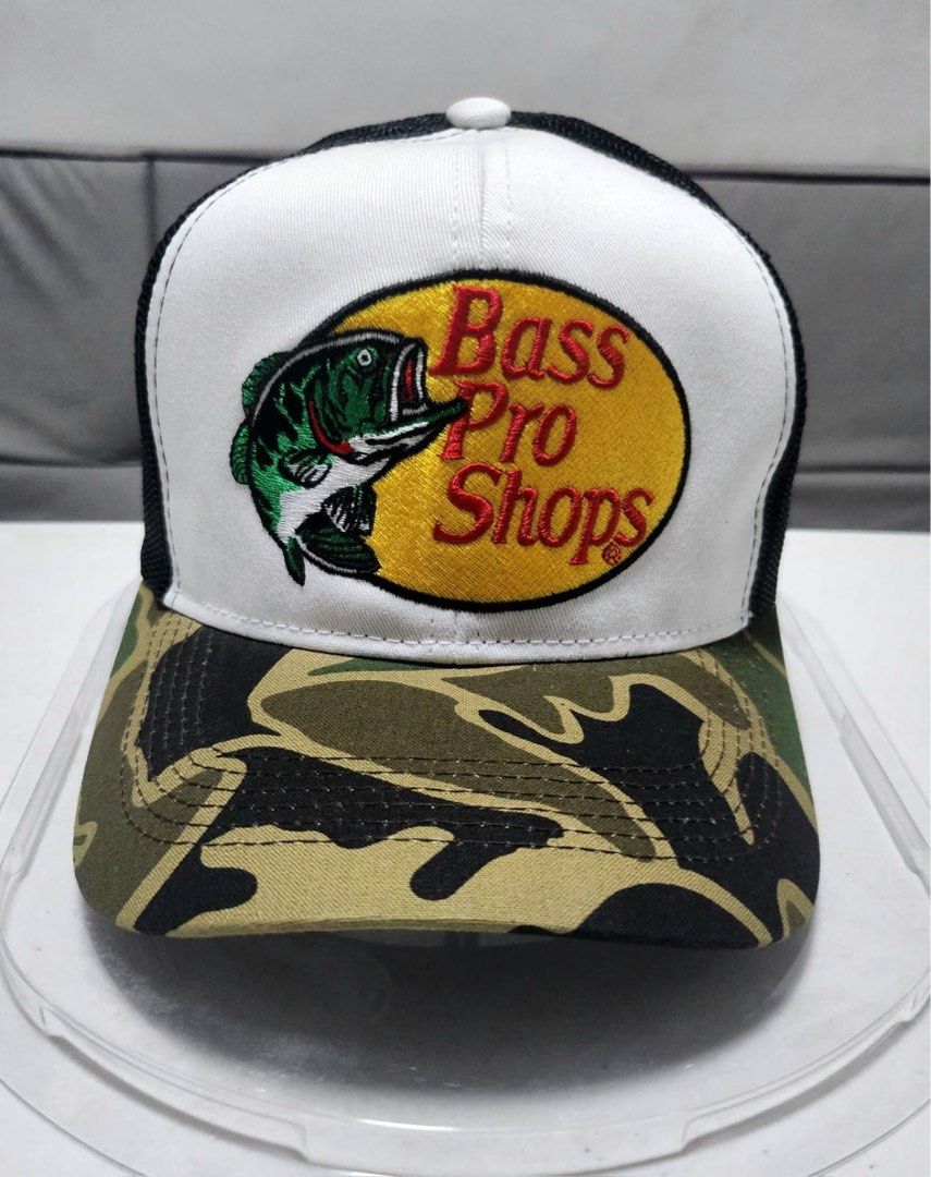 Bass Pro Shops Camo Trucker Cap 2 tone (Category: Caps & Hats) located in San Juan City. Submitted by roror0cks (Listing ID 1437854579, Image 1). Description: - Bass Pro Shops 2 tone camou - White front panel with logo - Camo brim - Black mesh back - Adjustable snap closure - Trucker style - Perfect for outdoor activities or casual wear Pm your tawad lang mga boss.