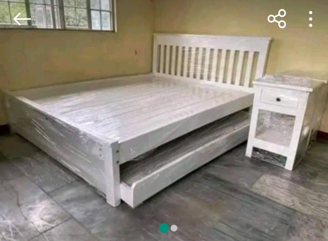 bedframe with pull out (Category: Bed Frames & Mattresses) located in Manila. Submitted by rhoda_81 (Listing ID 1437800244, Image 1). Description: made to order palochina wood , semi double bed ,with single pull out and small center table any paint color request are available we accpet custumized design located general trias cavite, binan laguna interested client call me.