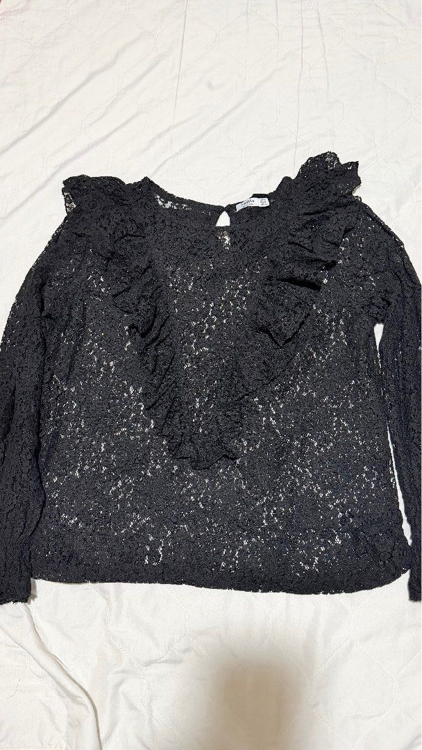 Bershka Black Lace Top (Category: Sleeveless) located in Manila. Submitted by hellokittyjhoe (Listing ID 1437817985, Image 1). Description: - Bershka black lace top - Size: EUR S, USA S, MEX 26 - Features: Long sleeves, ruffled front - Made in China - Dress up or down.