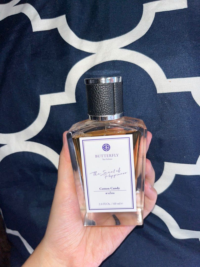 Butterfly Thai Perfume Cotton Candy (Category: Fragrance & Deodorants) located in Caloocan City. Submitted by mutya-25192 (Listing ID 1437926966, Image 2). Description: Few sprays missing. Bought in Bangkok, Thailand. Performance: Strong projection, noticeable sillage, long-lasting .