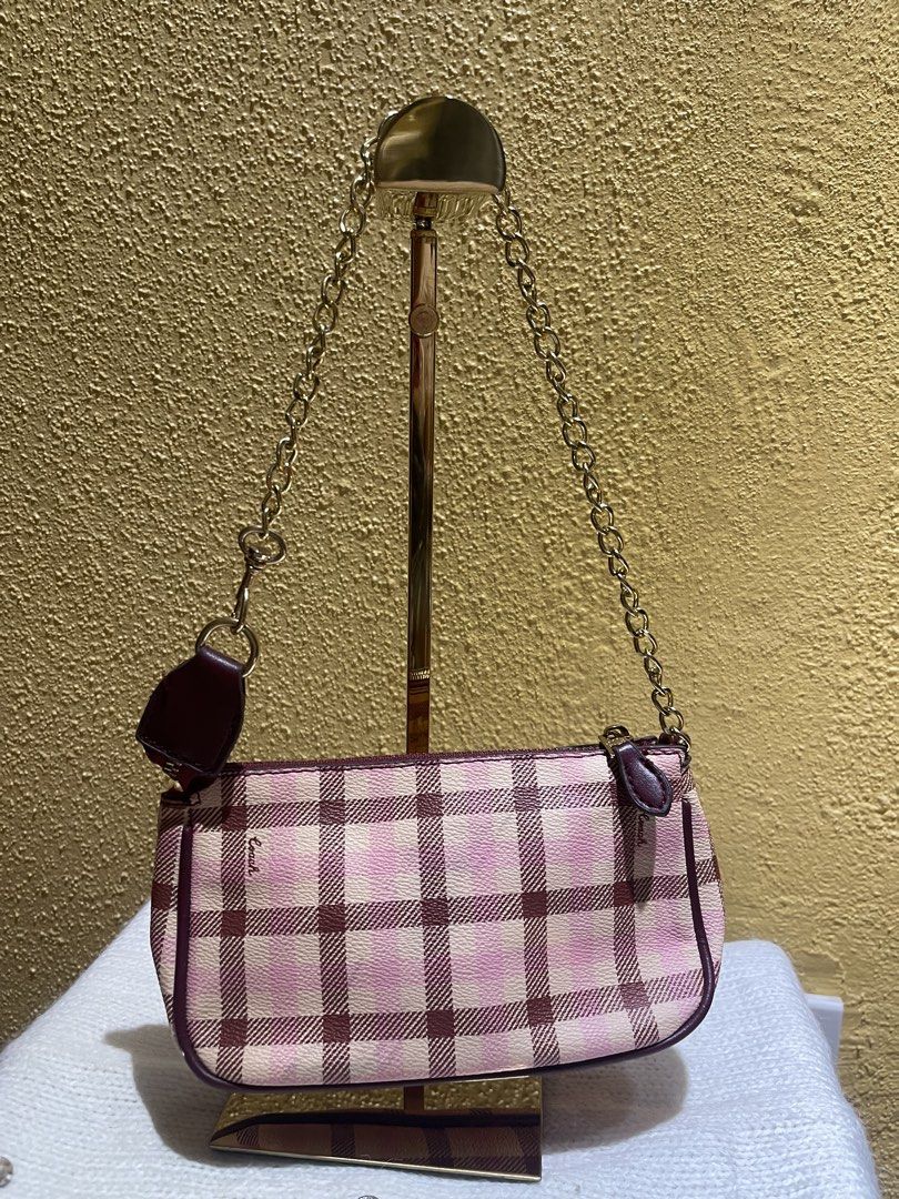 MILESTONE SALE: C colored patterned shoulder bag/wristlet (Category: Purses & Pouches) located in Dasmarinas. Submitted by hwcatbp (Listing ID 1437808181, Image 2). Description: MILESTONE SALE FROM 2999 to 1999 ℹ️ C Purple,pink and cream colored patterned shoulder bag/wristlet ℹ️ Condition: Excellent to Very Good condition (Rank 9.3/10). ℹ️ Details: 95x2x4.5 inches. Zippered compartment with card slots and very clean ℹ️ Inclusions: Generic dust b