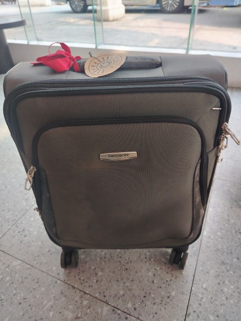 Cabin Samsonite Spinner Luggage (Category: Luggage) located in Manila. Submitted by purediamond888 (Listing ID 1437932839, Image 1). Description: - Samsonite spinner luggage - Dark grey exterior - Multiple compartments - Telescopic handle and wheels for easy transport - Interior mesh pocket - Interior straps to secure belongings - Original tags still attached - Unused condition.