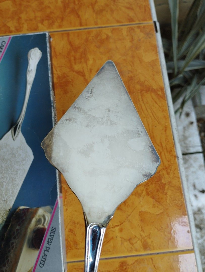 Cake Server Silver Plated (Category: Dinnerware & Cutlery) located in San Fernando. Submitted by nerosales (Listing ID 1437802937, Image 3). Description: Silver Plated Cake Server length: 11.5 inches 250 pesos only SAM City Pampanga Shipping: J&T Payment: Gcash NO COD/ NO COP.
