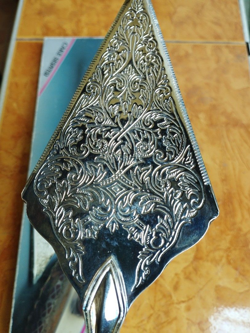 Cake Server Silver Plated (Category: Dinnerware & Cutlery) located in San Fernando. Submitted by nerosales (Listing ID 1437802937, Image 2). Description: Silver Plated Cake Server length: 11.5 inches 250 pesos only SAM City Pampanga Shipping: J&T Payment: Gcash NO COD/ NO COP.