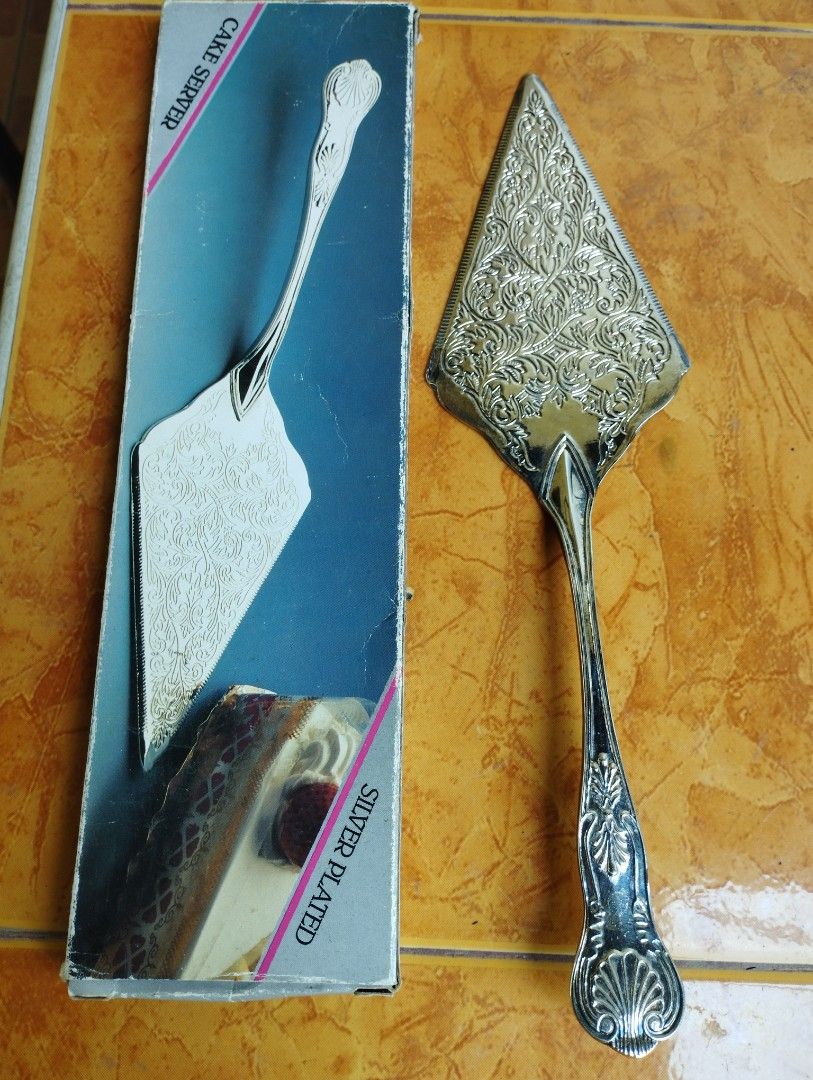 Cake Server Silver Plated (Category: Dinnerware & Cutlery) located in San Fernando. Submitted by nerosales (Listing ID 1437802937, Image 1). Description: Silver Plated Cake Server length: 11.5 inches 250 pesos only SAM City Pampanga Shipping: J&T Payment: Gcash NO COD/ NO COP.