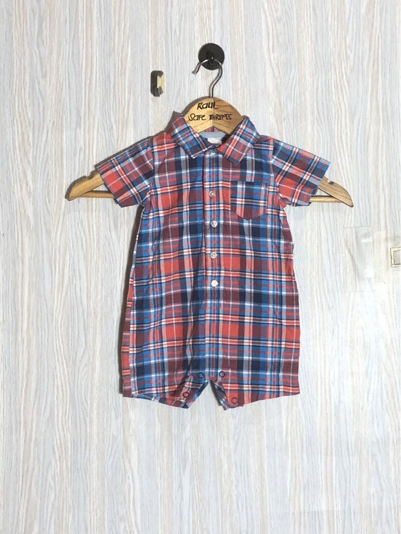Carter's Baby Romper 6 Months (Category: Babies & Kids Fashion) located in Montevista. Submitted by rdthriftshub (Listing ID 1437844427, Image 1). Description: - Carter's baby romper - Size: 6 months - Pattern: Red, blue, and white plaid - Made in Thailand - Features: Button-down front, chest pocket, short sleeves - Suitable for warm weather - Weight range: 12.5-16.5 lbs (5.7-7.5 kg).