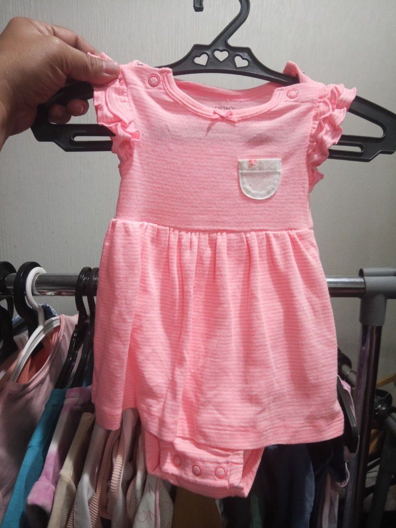 Carter's Pink Ruffle Sleeve Dress 3 months (Category: Babies & Kids Fashion) located in Quezon City. Submitted by Tasi671 (Listing ID 1437901626, Image 1). Description: - Adorable pink baby dress from Carter's. - Features a cute pocket detail. - Ruffle sleeves add a touch of charm. - Gathered skirt for a sweet look. - Snap closures at the bottom for easy changes. - Perfect for your baby!.