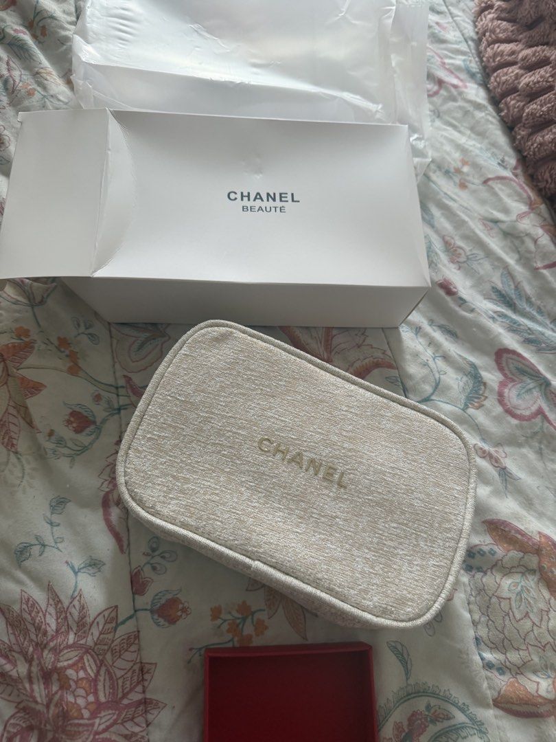Chanel Beaute Cosmetic Bag (Category: Luxury Bags & Wallets) located in Manila. Submitted by sophia.triz (Listing ID 1437868174, Image 1). Description: - Authentic Chanel Beaute cosmetic bag - Features the iconic Chanel logo - Comes with original box - Neutral color for versatile styling - Ideal size for travel and everyday makeup storage.