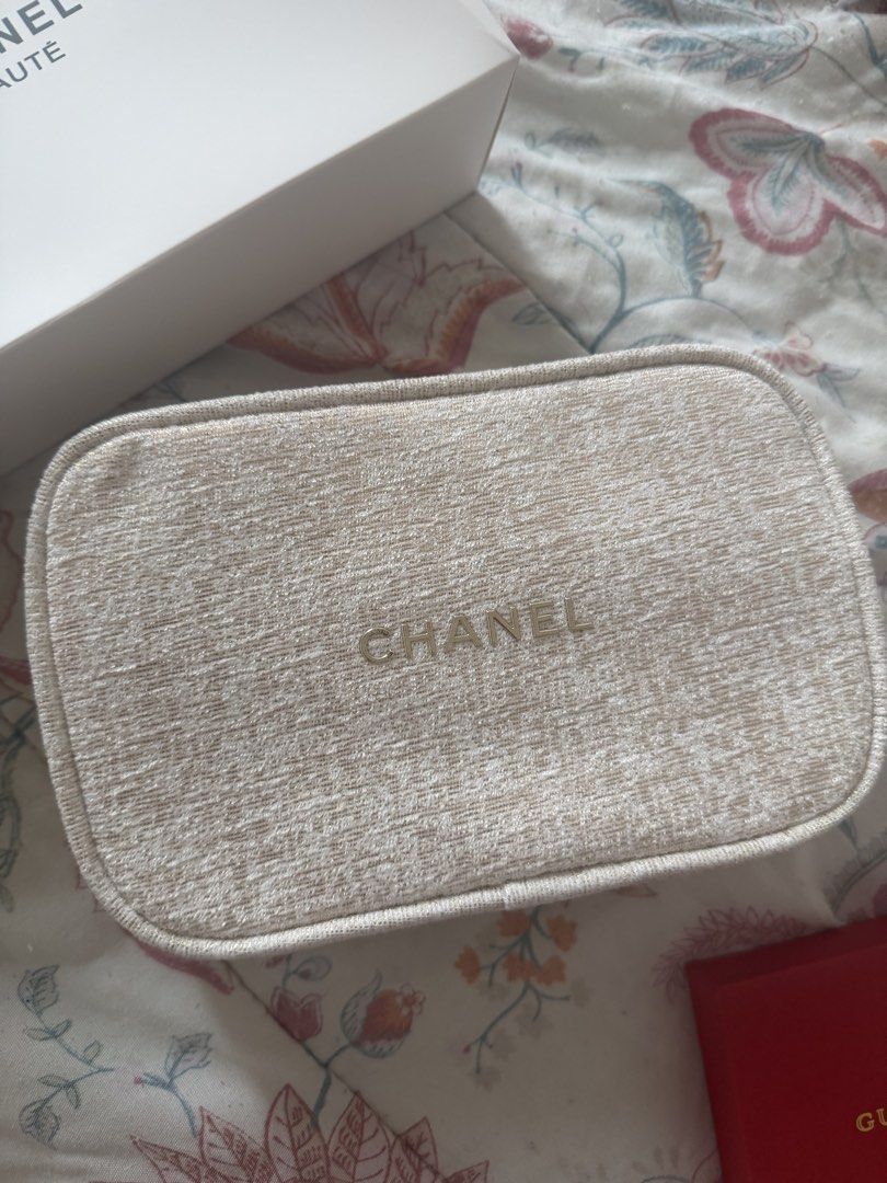 Chanel Beaute Cosmetic Bag (Category: Luxury Bags & Wallets) located in Manila. Submitted by sophia.triz (Listing ID 1437868174, Image 2). Description: - Authentic Chanel Beaute cosmetic bag - Features the iconic Chanel logo - Comes with original box - Neutral color for versatile styling - Ideal size for travel and everyday makeup storage.