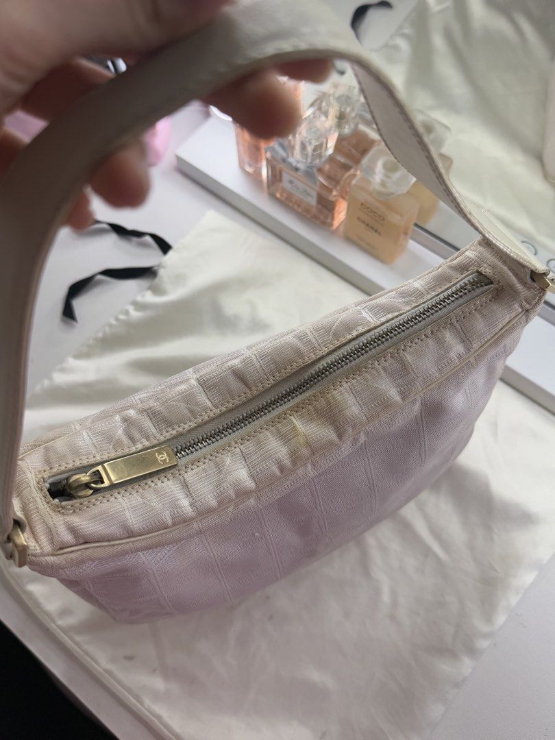 Chanel Travel Line Shoulder Bag (Category: Luxury Bags & Wallets) located in Quezon City. Submitted by iadourysl (Listing ID 1437930362, Image 2). Description: vintage original guaranteed. moneyback, has stains in the nylon body needs cleaning/ bag spa. ( Bought in Japan ) no flaw - bag needs cleaning - actual pics posted.