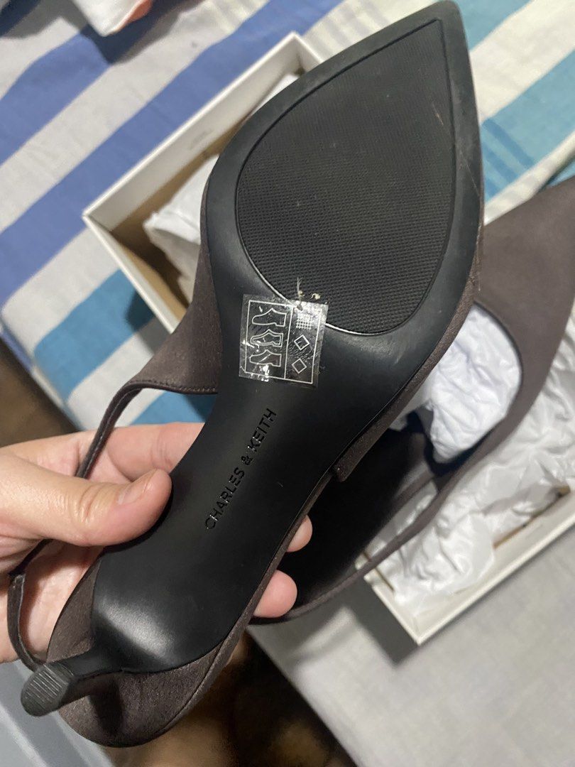 Charles & Keith Pointed Slingback Heels (Category: Heels) located in Mandaluyong City. Submitted by _adjh (Listing ID 1437929989, Image 3). Description: last price posted - no lowballing, please - Charles & Keith slingback heels - Color: Brown - Size: 37 - Pointed toe design - Slingback strap - Comes with original box and paperbag - Used for a few hours only - Got this in SM Megamall - no more last price; no lowballing pls. used this pair for 8 h