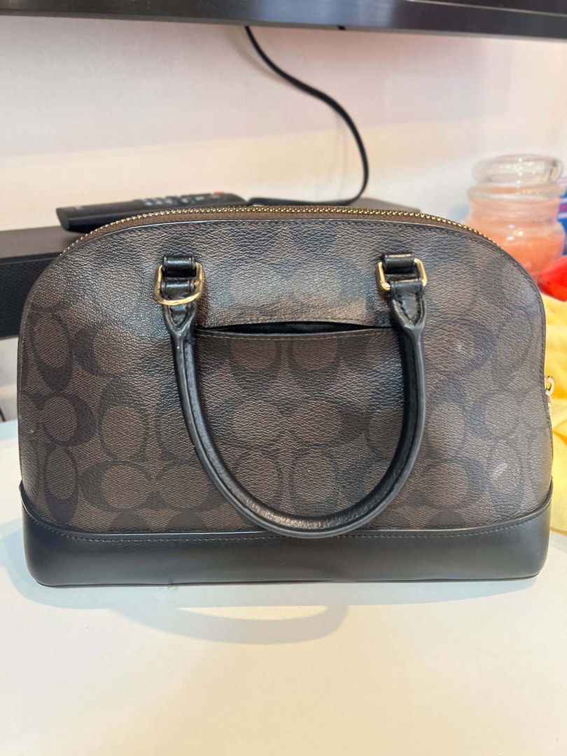 Coach Mini Sierra (Category: Luxury Bags & Wallets) located in Manila. Submitted by offsetx (Listing ID 1437907665, Image 2). Description: Coach Mini Sierra Satchel in signature coated canvas and black leather trim With Crossbody strap Gold tone Hardware Detachable strap for crossbody wear Decluttering sale 4.5k only 101% Authentic Pickup/meetup/shipping .