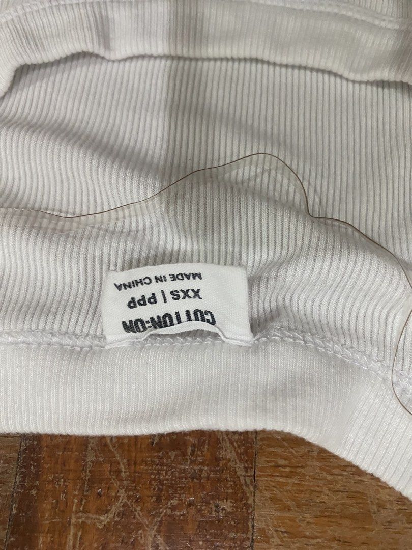 Cotton On Ribbed Square Neck Top - XXS (Category: Shirts) located in Manila. Submitted by boomboomshakataka (Listing ID 1437870200, Image 2). Description: - Cotton On white ribbed top - Size: XXS - Features a square neckline - Short sleeves - Made in China.