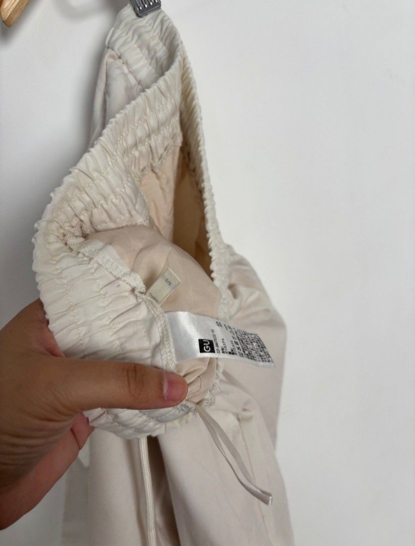 Cream Cargo Pants with Drawstring (Category: Other Bottoms) located in Guimba. Submitted by xeeeyaaaah (Listing ID 1437839429, Image 3). Description: - Cream-colored cargo pants - Relaxed fit - Drawstring waist for adjustable fit - Adjustable cuffs - Two side cargo pockets - Lightweight material - Ideal for casual wear -W24-28, L36.5.