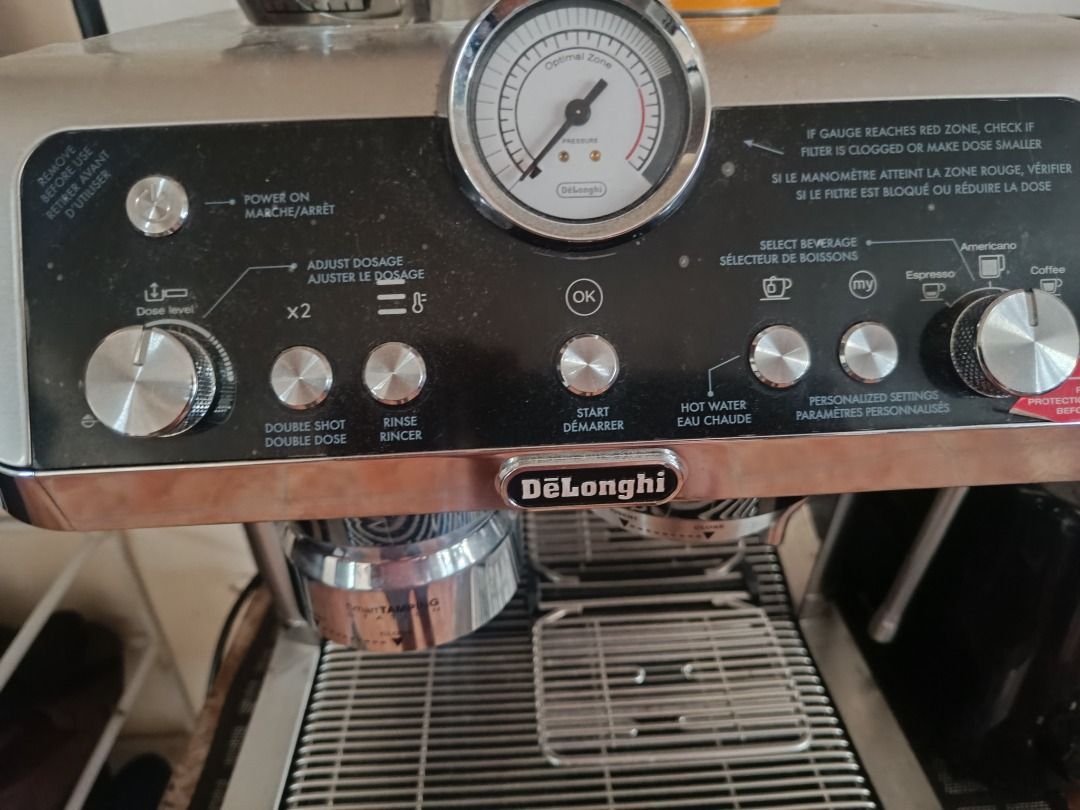 DeLonghi Specialist Espresso Machine (Category: Coffee Machines & Makers) located in Las Pinas. Submitted by theredsellerqueen (Listing ID 1437865035, Image 2). Description: - DeLonghi Specialist espresso machine - Features: - Double shot setting - Rinse function - Hot water option - Built-in grinder with adjustable grind size - Pressure gauge - Multiple beverage selection options.