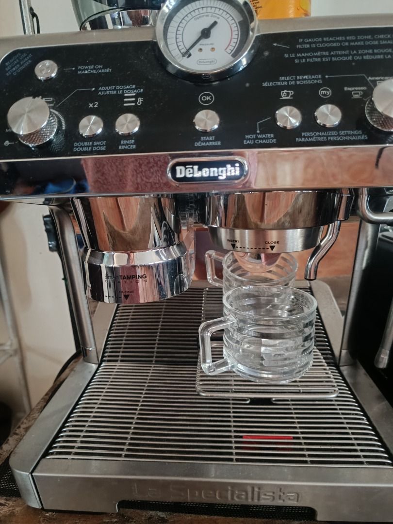 DeLonghi Specialist Espresso Machine (Category: Coffee Machines & Makers) located in Las Pinas. Submitted by theredsellerqueen (Listing ID 1437865035, Image 1). Description: - DeLonghi Specialist espresso machine - Features: - Double shot setting - Rinse function - Hot water option - Built-in grinder with adjustable grind size - Pressure gauge - Multiple beverage selection options.