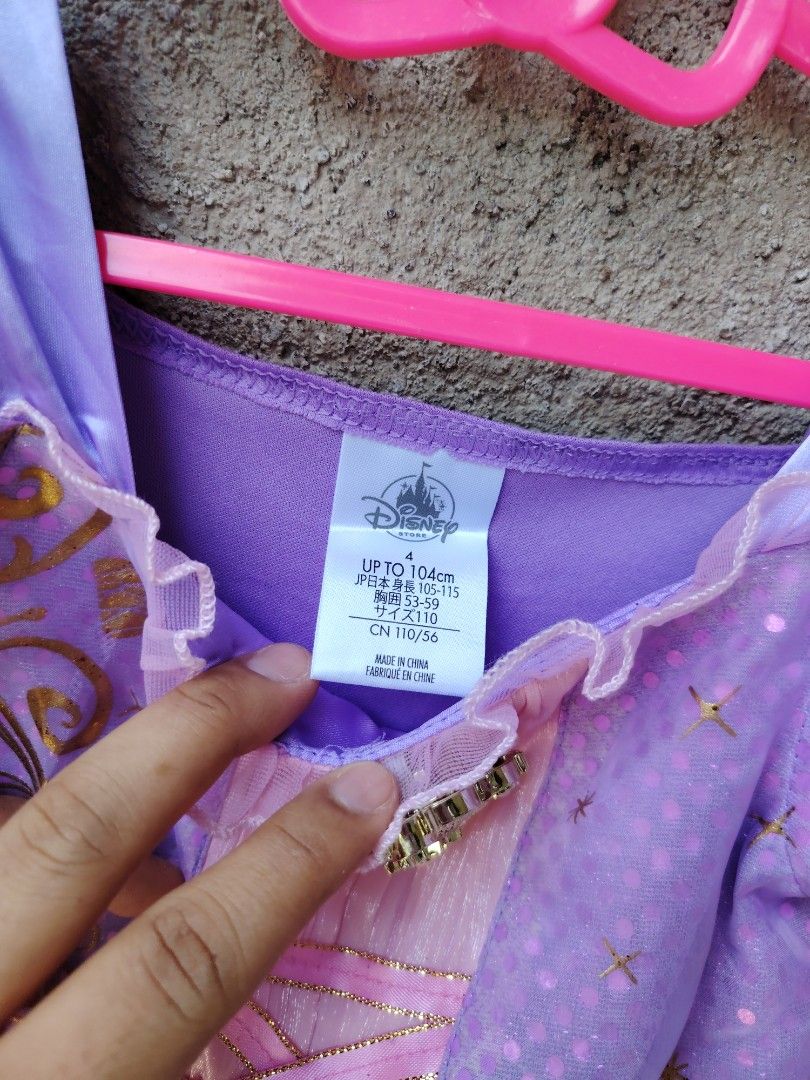 Disney Rapunzel Dress - Size 4 (Category: Babies & Kids Fashion) located in Makati City. Submitted by Prettykids (Listing ID 1437796794, Image 3). Description: - Disney Rapunzel Dress - Size: 4 (fits up to 104cm) - Colors: Purple and Pink - Glitter accents on skirt - Gold bodice detailing - Pink ribbon corset design - Includes Disney tag Original Disney Rapunzel Gown Size 4 GOOD AS NEW LOC: NUEVA ECIJA MOP:GCASH/BDO COURIER:J&T EXPRESS .