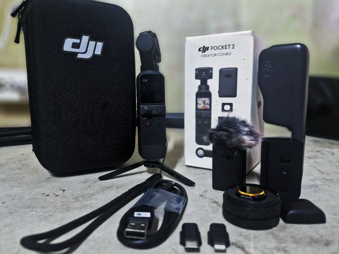DJI Pocket 2 Creator Combo (Category: Cameras) located in Antipolo. Submitted by fou_lafini (Listing ID 1437763556, Image 2). Description: Selling my preloved DJI pocket 2 creator combo. Well taken care of. Used for travels. What's included: DJI osmo pocket 2 Pocket 2 plastic case DJI mic Do it all Handle Neccessary connectors Original box included Free: Hard case for the unit Sunnylife ND filter -16 Meetup: Antipolo City less - DJI Pocket 2 Crea