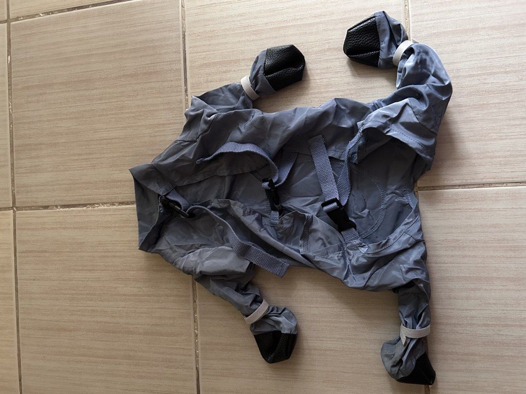 Dog Waterproof jumpsuit Raincoat with Booties (Category: Homes & Other Pet Accessories) located in Pasig City. Submitted by faqui (Listing ID 1437861030, Image 3). Description: Type: waterproof dog jumpsuit Material: waterproof memory cloth Color: blue Size: XL Breathable adjustment Reason for selling: I already bought a new one..